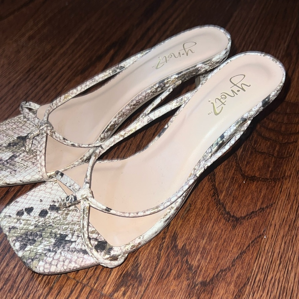 Low snakeskin heels